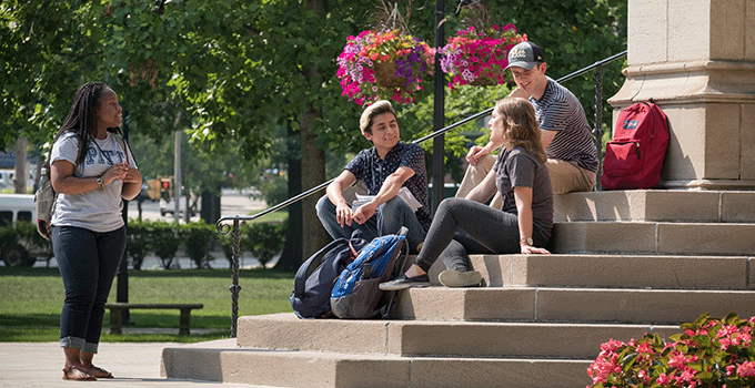 Students sitting on steps