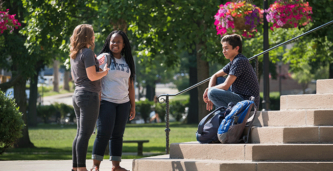Students talking on steps